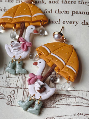 Rainy Day Ducks, Yellow Umbrella