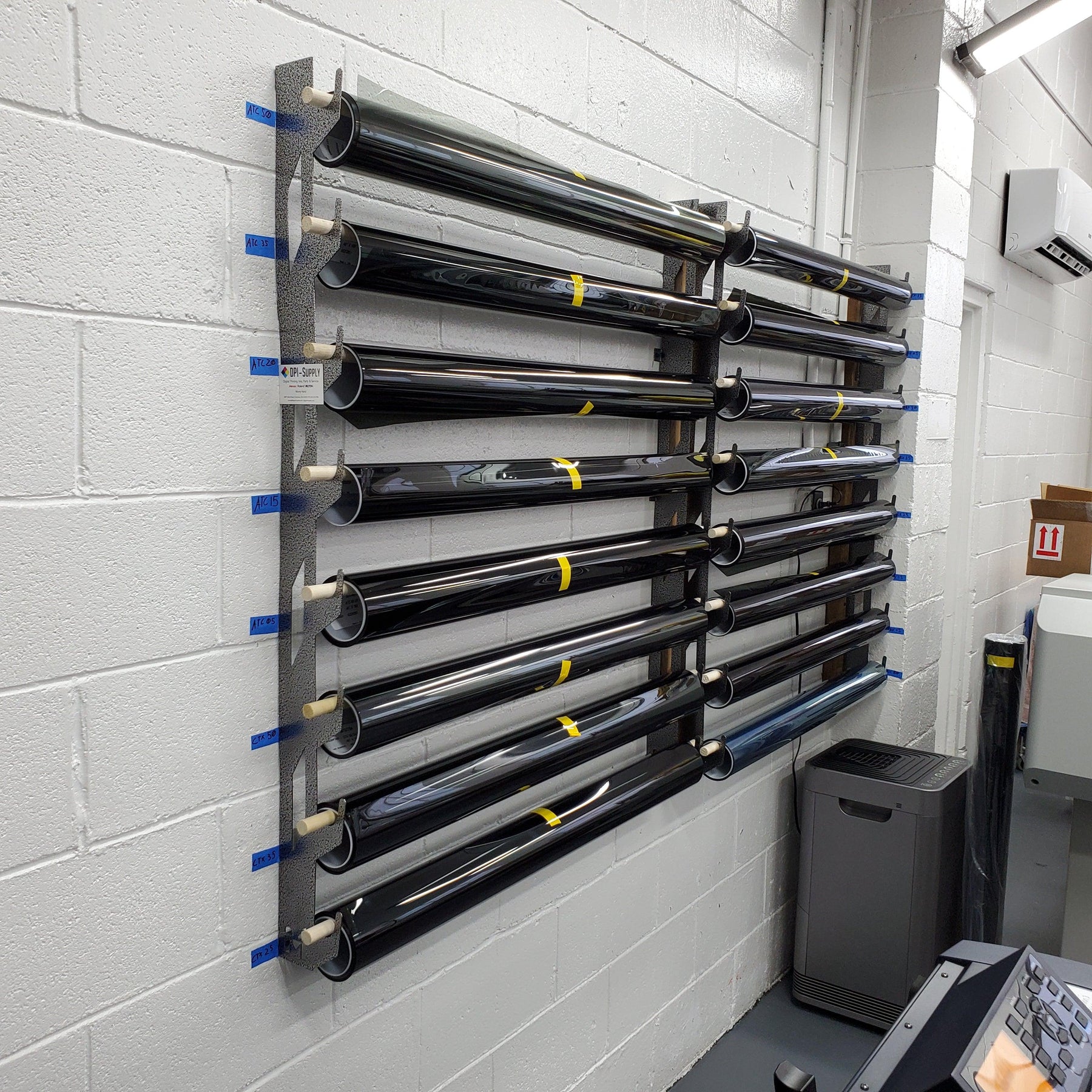 Wall-Mounted Vinyl, Tint, Paper & Cloth Wrap Rack - Modular Storage | Martin Metalwork"