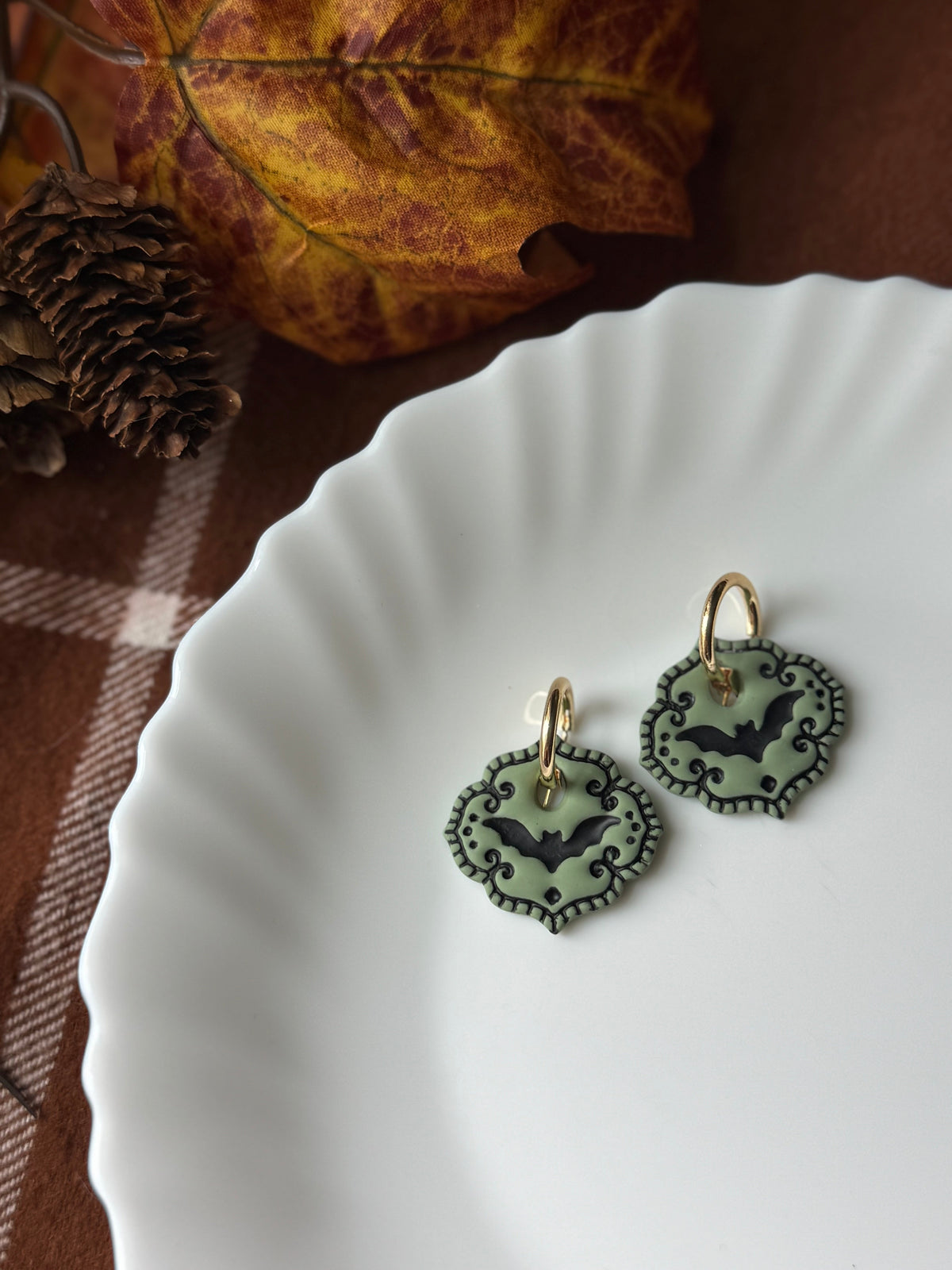 Bat Cameo Olive handmade polymer clay earrings by Shop Something Earthy — view 1 of 2