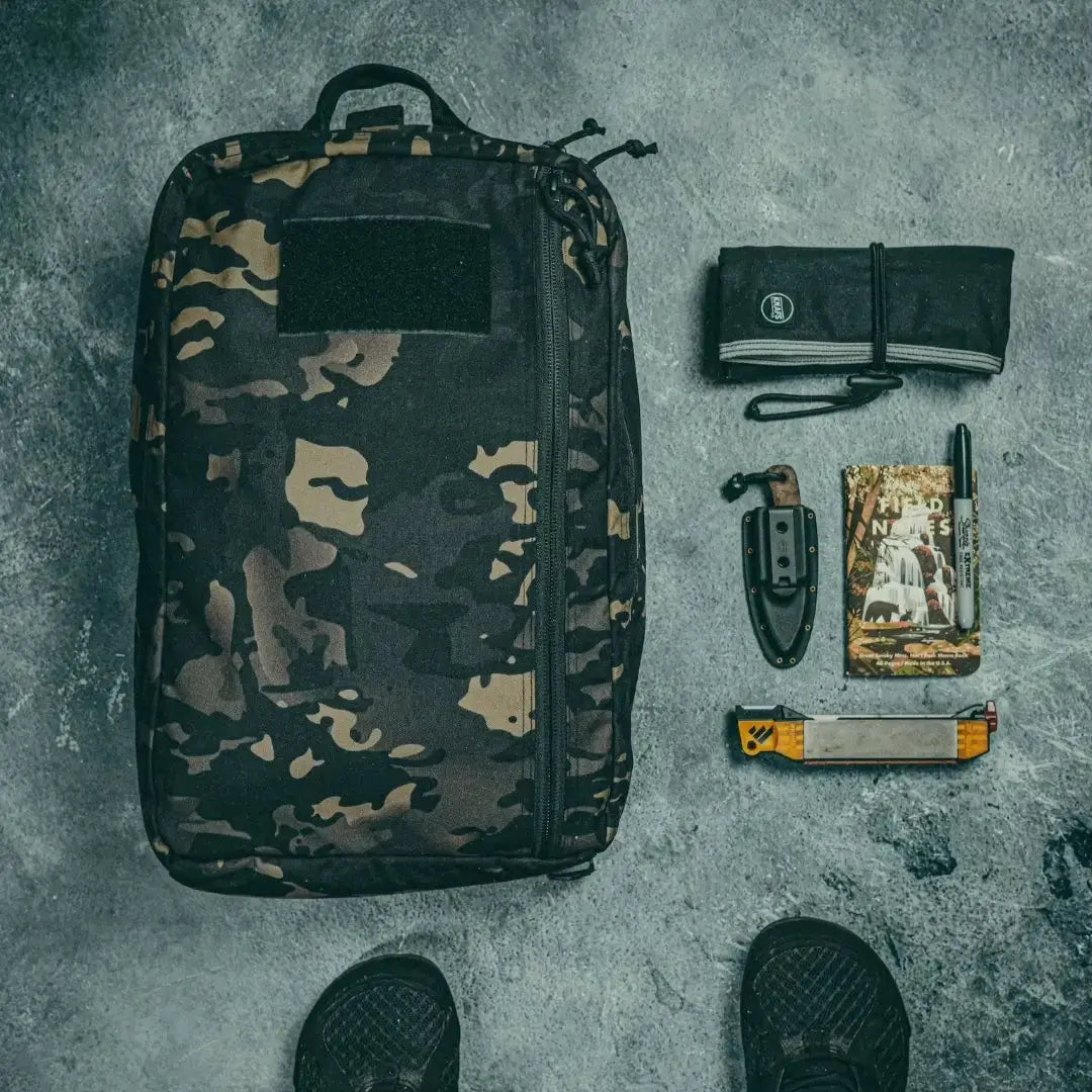 24 Hour Backpack 500D Cordura nylon with knife, notebook, and marker.