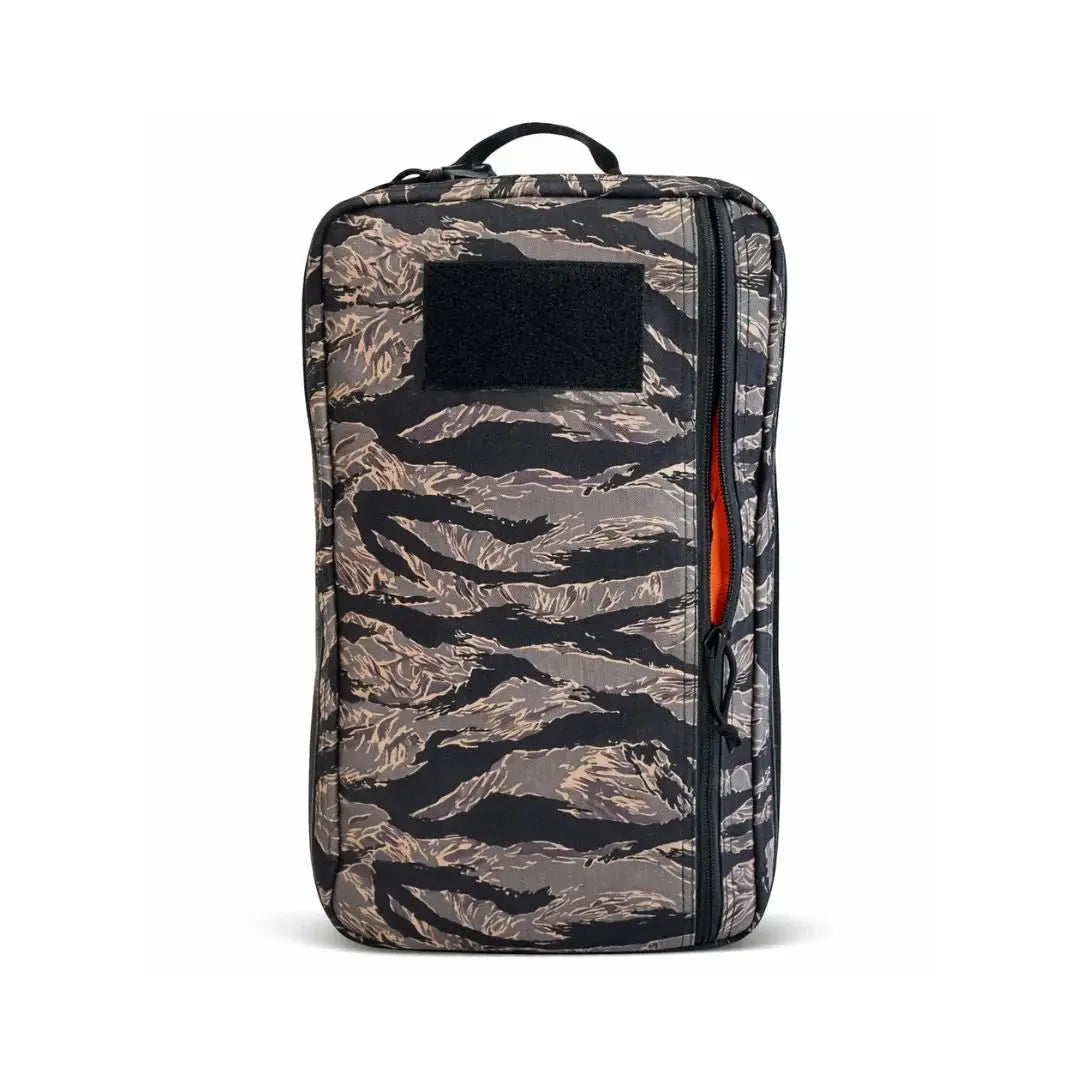 Camouflage 24-hour backpack with black patch and orange interior detail