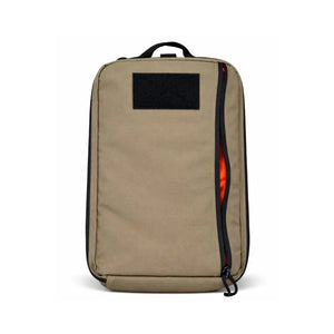 Tan 24-hour backpack with black patch and orange interior detail