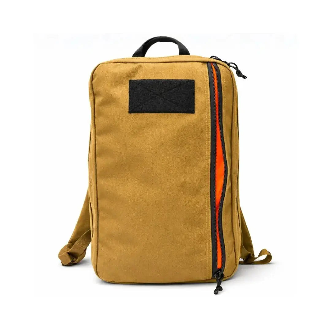 Brown Cordura backpack with orange interior zipper