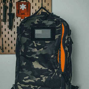 24 Hour Plus Backpack in black camouflage pattern with American flag patch.