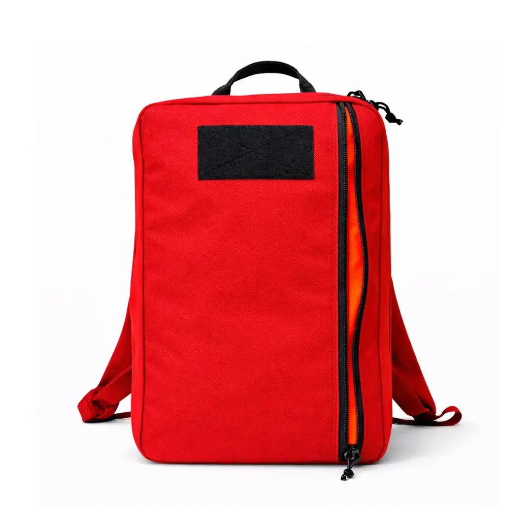 Red backpack with black patch and orange-lined zipper.