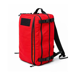 Red 24 Hour Plus backpack with black zippers, straps, and a Velcro patch.