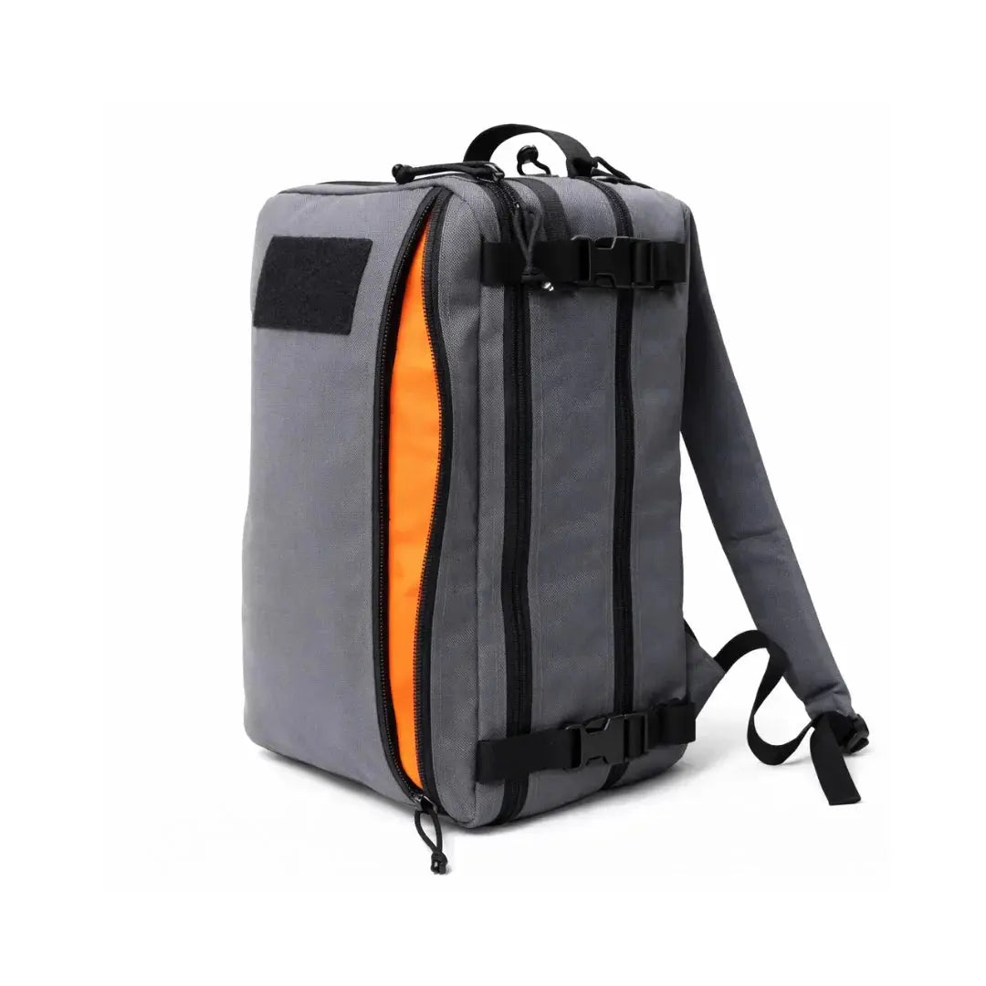 Grey 24 Hour Plus backpack with orange interior, black zippers, and buckles.