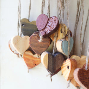 Hanging wooden heart ornaments made of natural jute twine