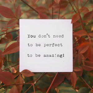 White card with typed text "You don't need to be perfect to be amazing!"