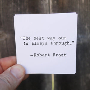 White card with black typewritten quote by Robert Frost about the best way out.