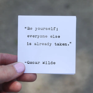 White card with typewriter quote "Be yourself; everyone else is already taken." by Oscar Wilde.