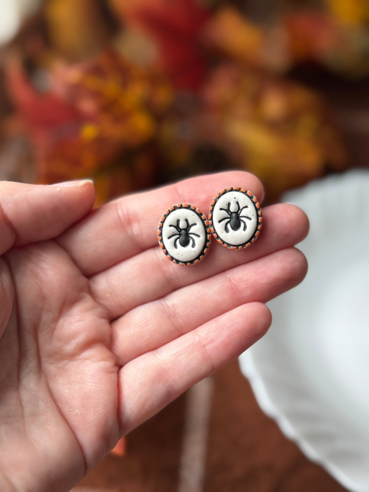Ivory Spider Studs handmade polymer clay earrings by Shop Something Earthy — view 1 of 2
