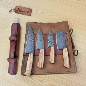 Handmade damascus steel knife with wood handle on dark surface