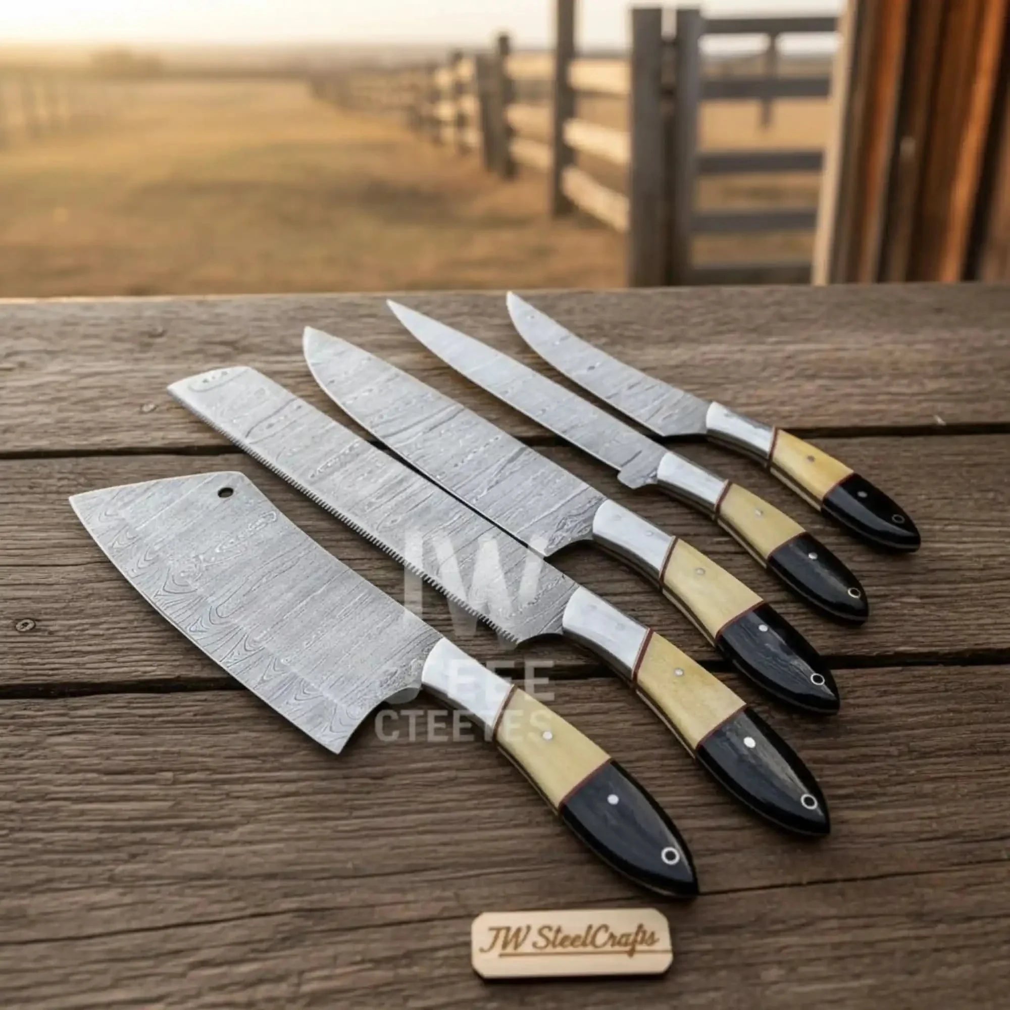 Handmade damascus steel knife with wood handle on dark surface