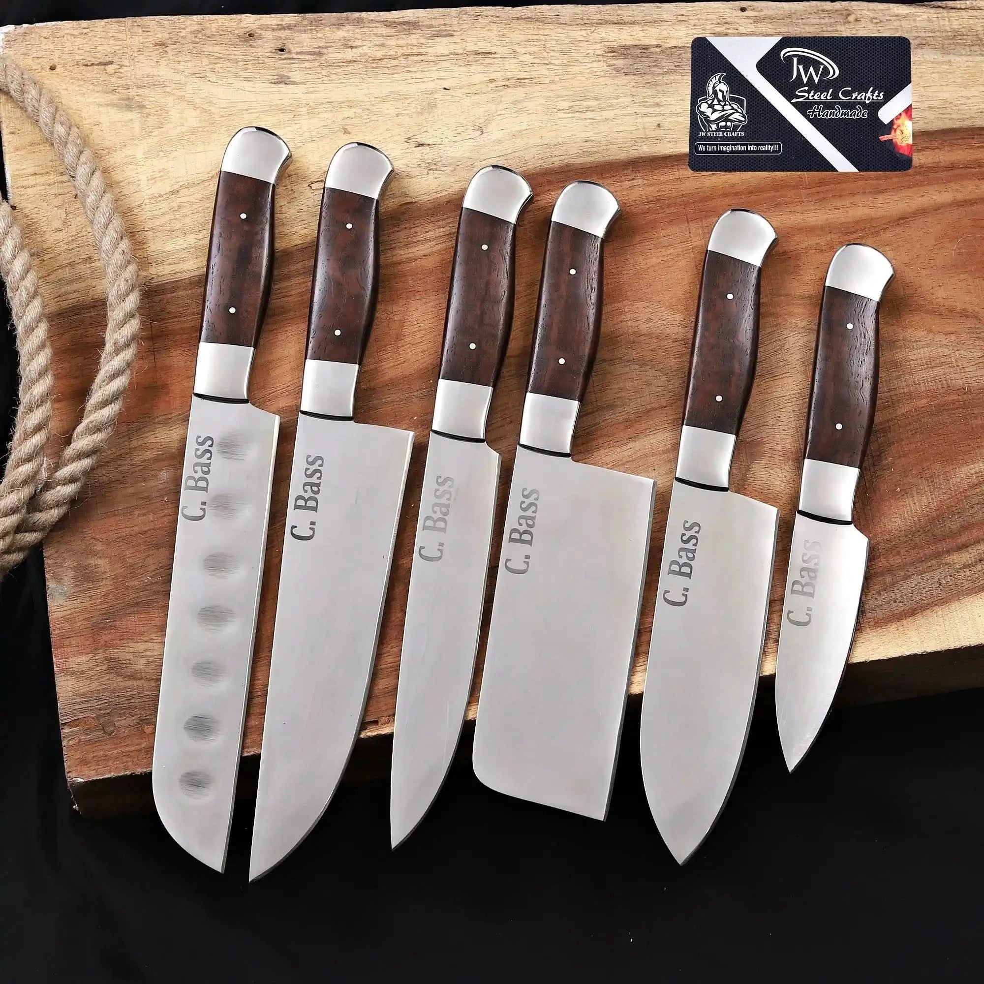 Handmade carbon steel steel knife with wood handle on dark surface