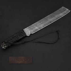 Handmade damascus steel knife with premium handle on dark surface