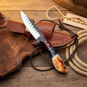 Trailblazer Amber Skinner Knife with dark wood amber resin butt cap handle