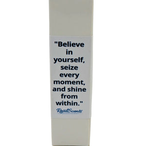 Close-up of a "Real Scents" product box with a quote: "Believe in yourself, seize every moment, and shine from within."