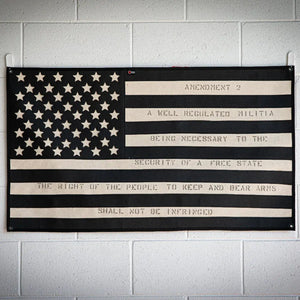 Black and white US flag displaying Second Amendment text, stars, and stripes.