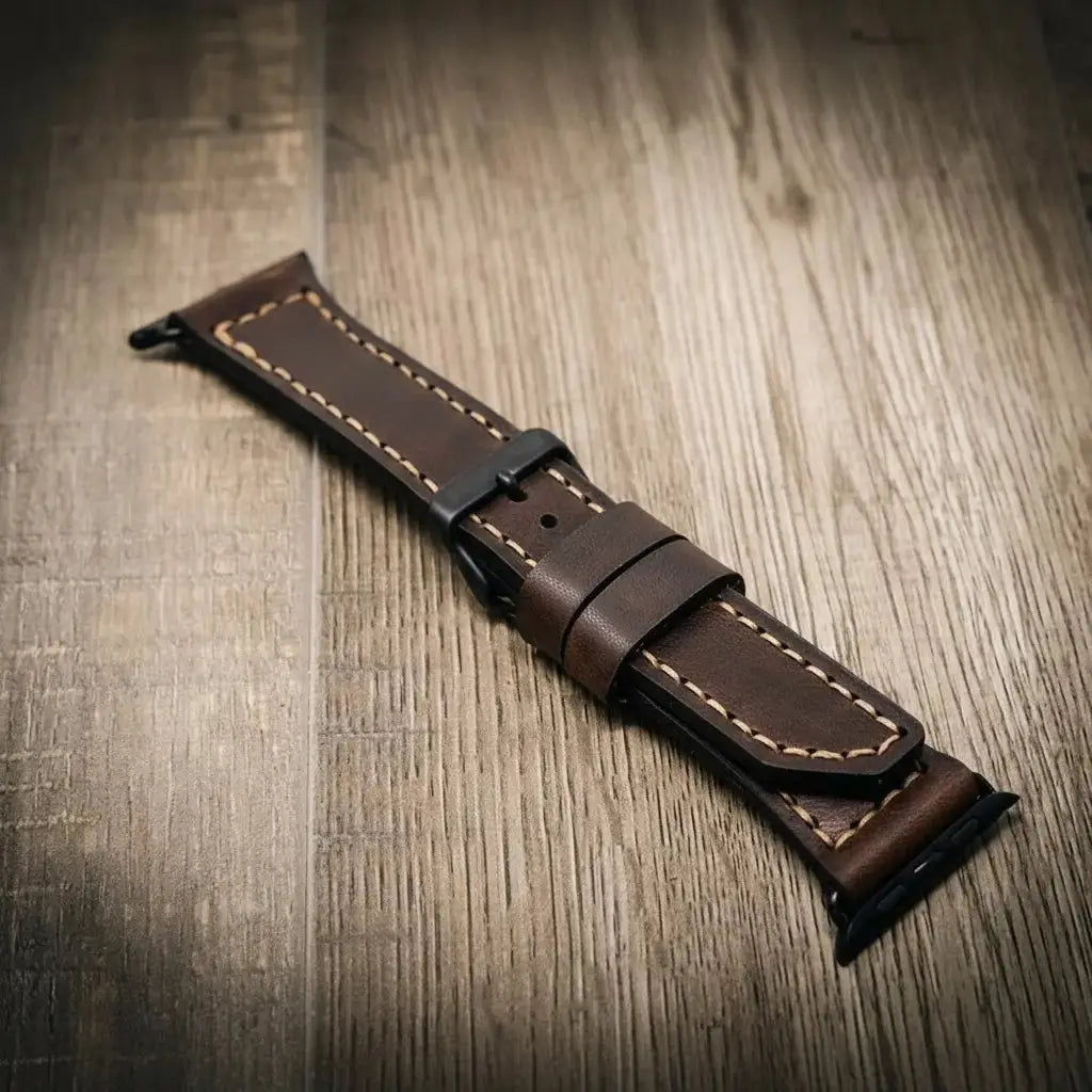 Brown full-grain leather Apple Watch band with white stitching