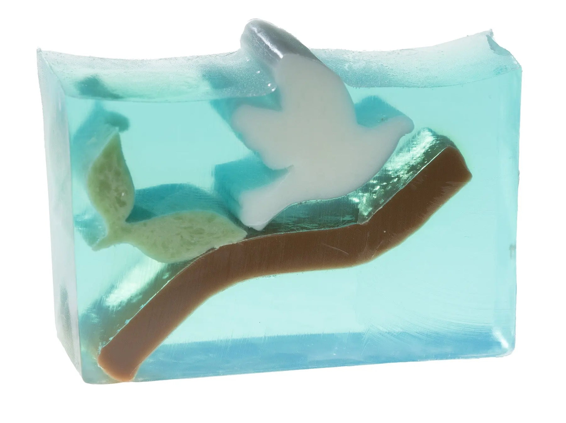 Clear blue soap with a white bird and brown branch embedded inside.
