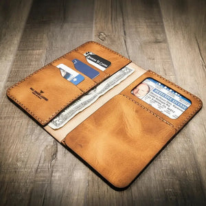 Brown leather long wallet with badge slot, ID window, card slots, and cash.