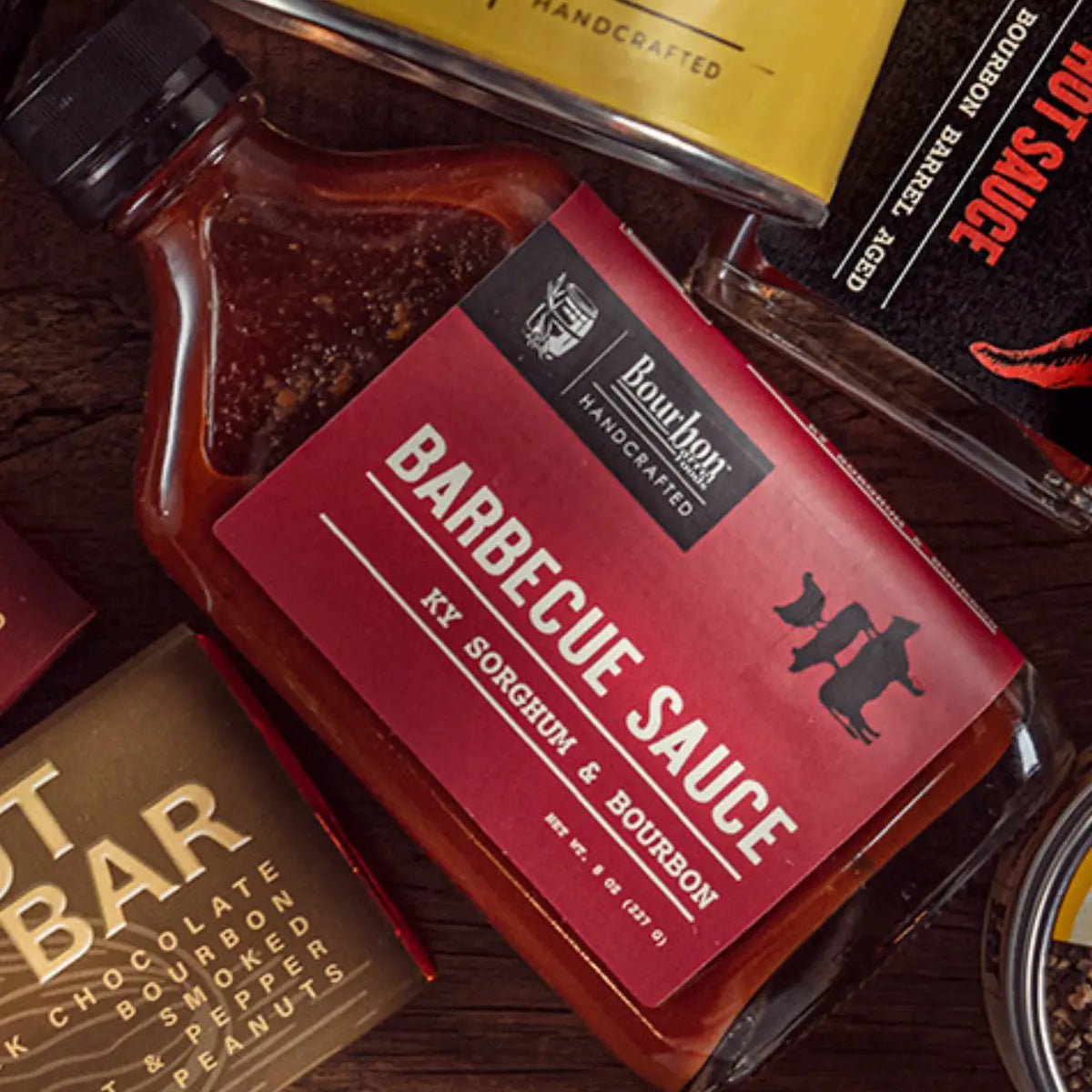 Glass bottle of Bourbon Barrel Aged Barbecue Sauce with Sorghum.