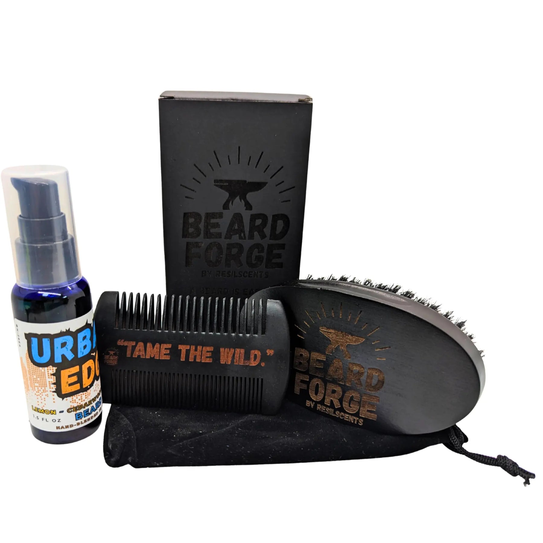 Beard grooming set: beard oil in blue bottle, comb, and brush with "Beard Force" logo, presented in black box with drawstring bag.