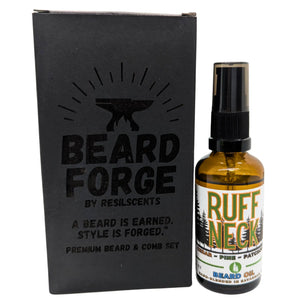 Beard Forge grooming set: Beard oil in amber bottle and black box with comb and brush.
