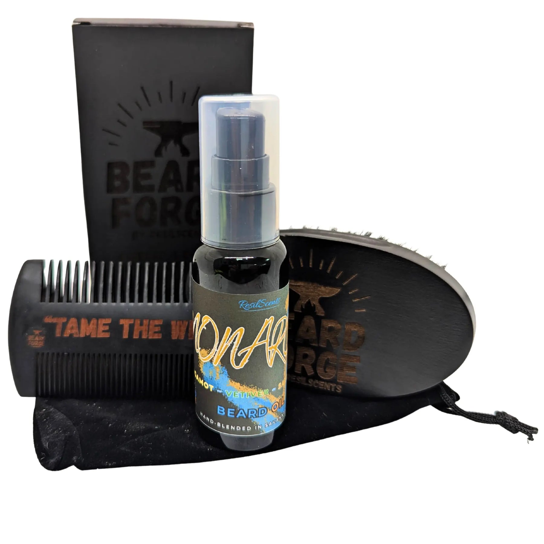 Beard Forge beard grooming set: oil bottle, wood comb and brush, black velvet bag, and box.