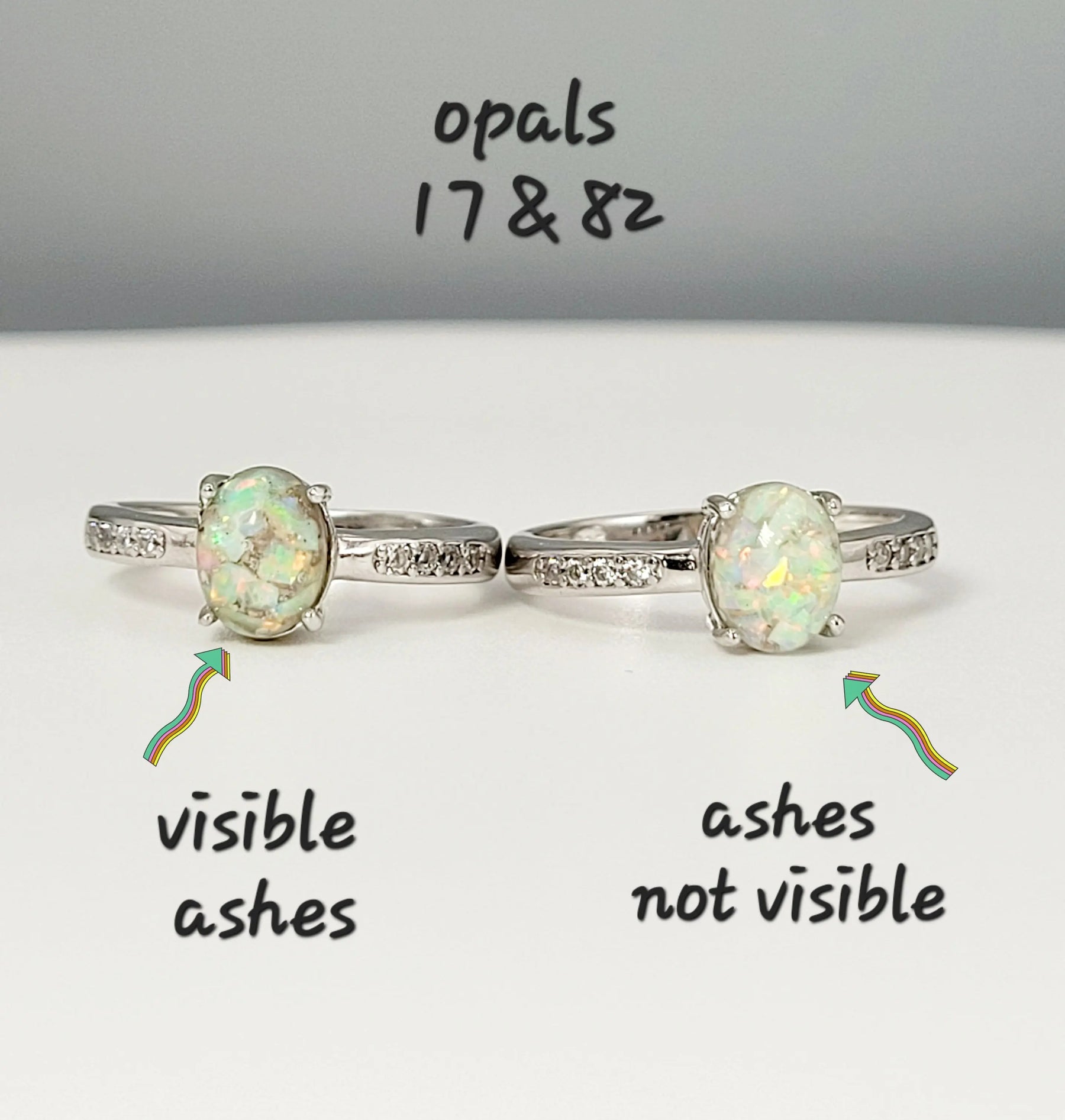 Two memorial rings: one opal ring with visible ashes, and one with ashes not visible, both set in sterling silver.