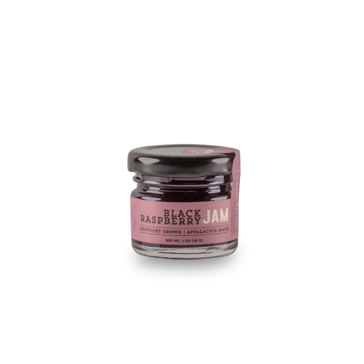 Small glass jar of black raspberry jam with a label indicating it's Kentucky grown.