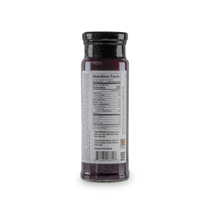 Black raspberry jam jar showing nutrition facts and ingredients.