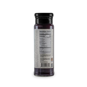 Blueberry Bourbon & Cardamom Jam in a glass jar from Bourbon Barrel Foods.