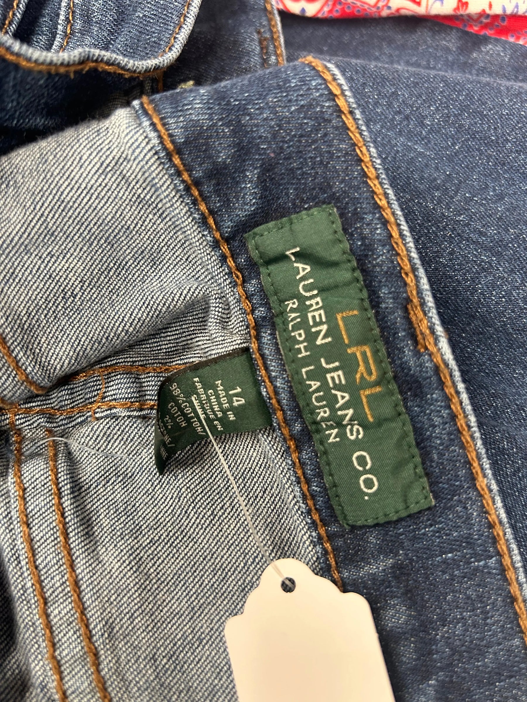 Lauren Jeans Co. jeans, size 14, made of 98% cotton/2% other fibers with a dark wash and brown stitching.
