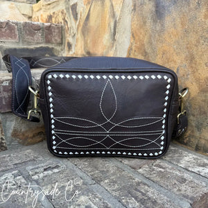 Brown genuine leather crossbody purse with white boot stitch design.