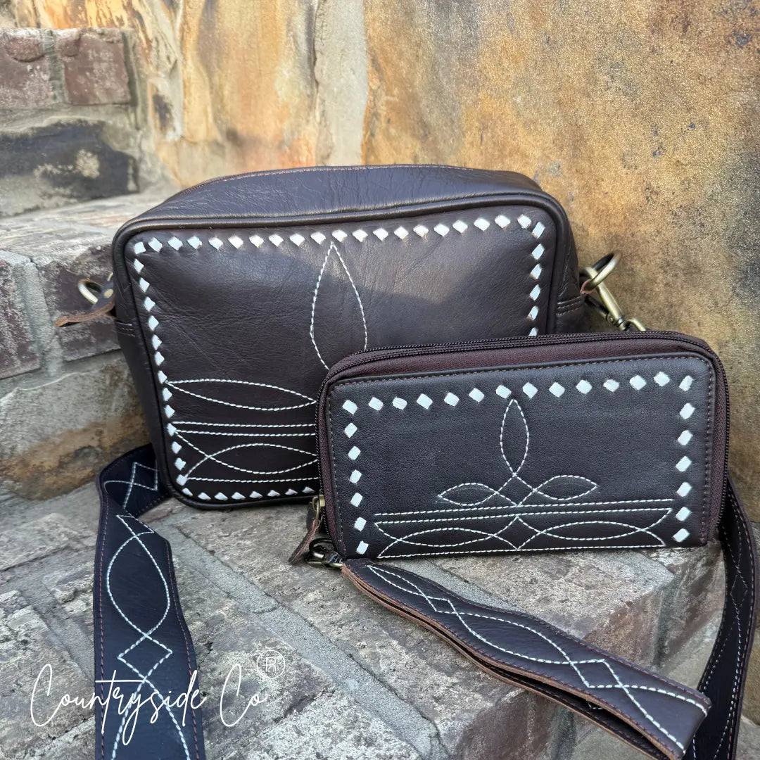 Brown leather cross-body purse and wallet with white stitching