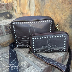 Brown leather cross-body purse and wallet with white stitching