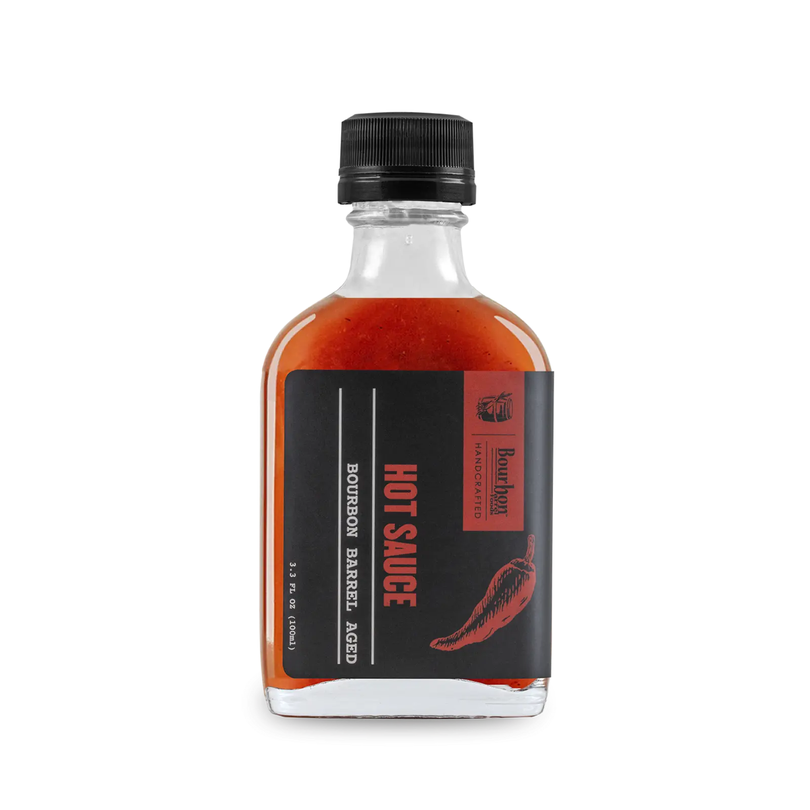 Bourbon Barrel Aged Hot Sauce in a clear glass bottle with a black cap and label.