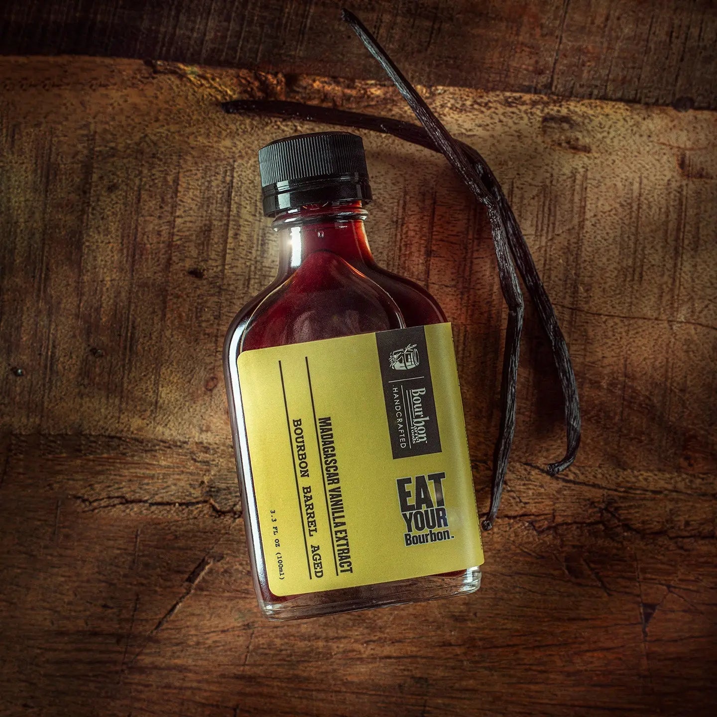 Bourbon barrel aged Madagascar vanilla extract bottle with vanilla bean