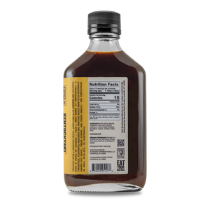 Bourbon Barrel Foods Kentuckyaki teriyaki sauce bottle with nutrition label.