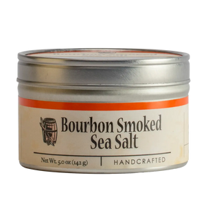 Bourbon Smoked Sea Salt in a metal tin with a label showing a barrel icon.