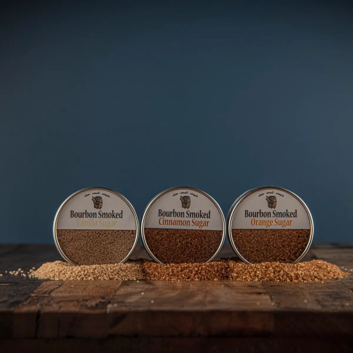 Bourbon Smoked Sugars Trio tins in vanilla, cinnamon, and orange flavors