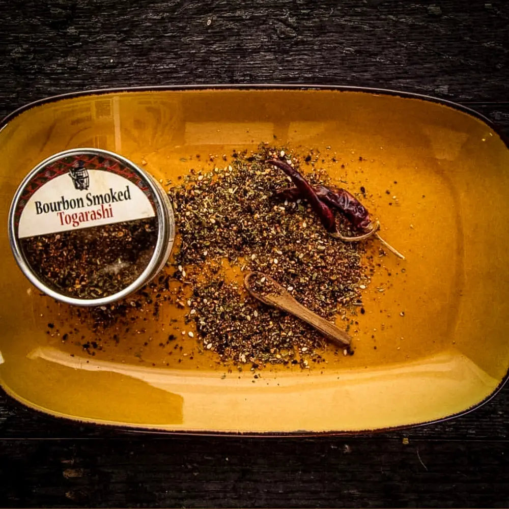 Bourbon Smoked Togarashi tin with wooden spoon and dried chili