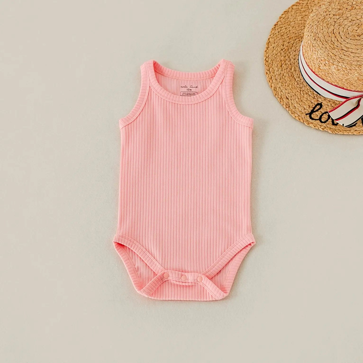 Bubble Gum Ribbed Organic Cotton Baby Onesie Nola Tawk