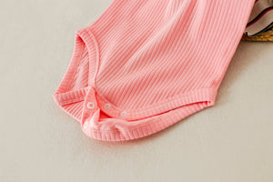 Bubble Gum Ribbed Organic Cotton Baby Onesie Nola Tawk