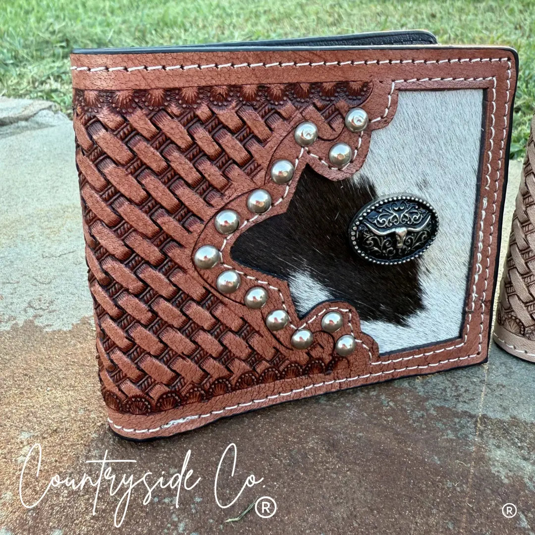 Buckhorn Cowhide Men's Wallet with tooled leather, cowhide, and longhorn emblem.