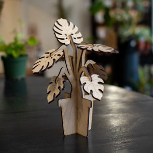3D wooden monstera plant model in a pot