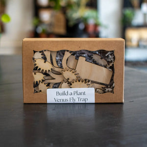 Wooden Venus Fly Trap 3D puzzle kit in a cardboard box