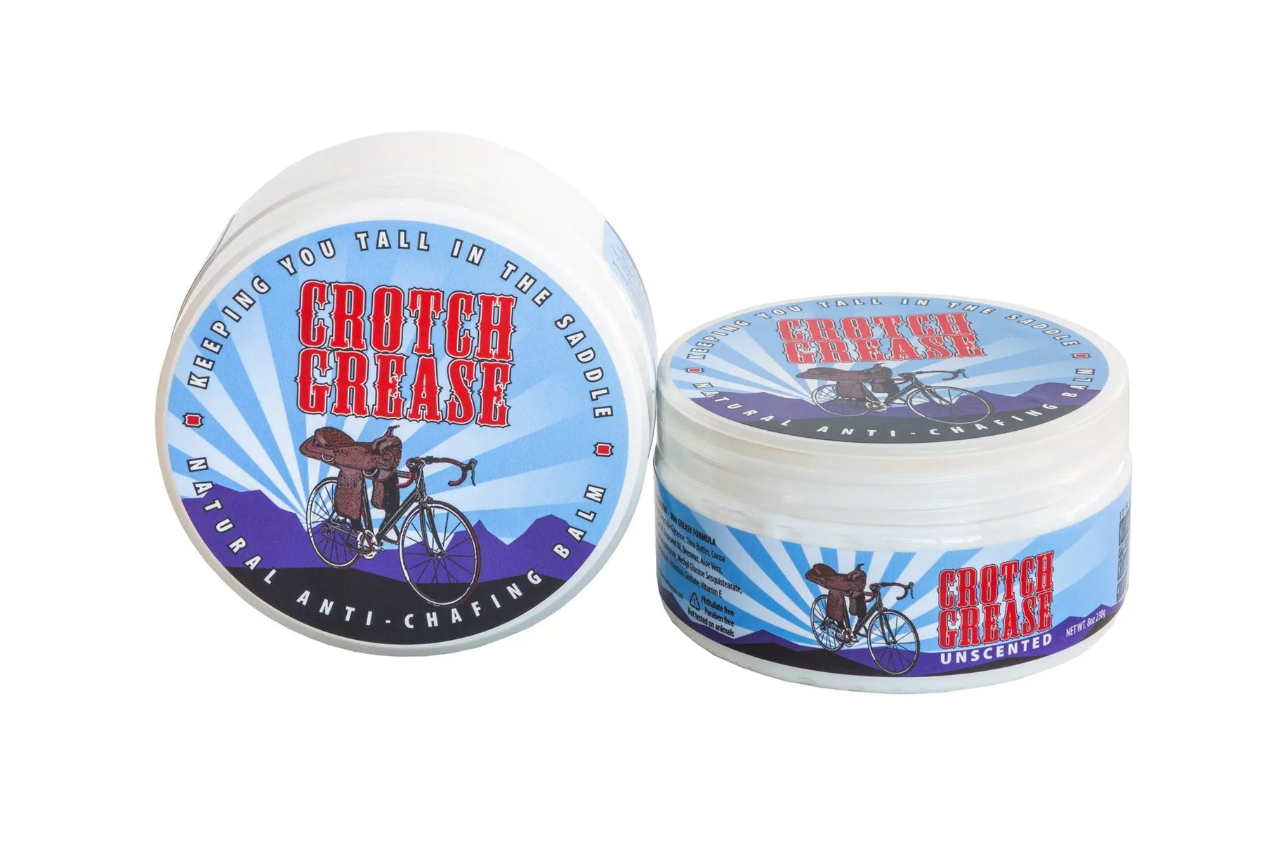 Two tubs of unscented anti-chafing balm with bicycle graphics.